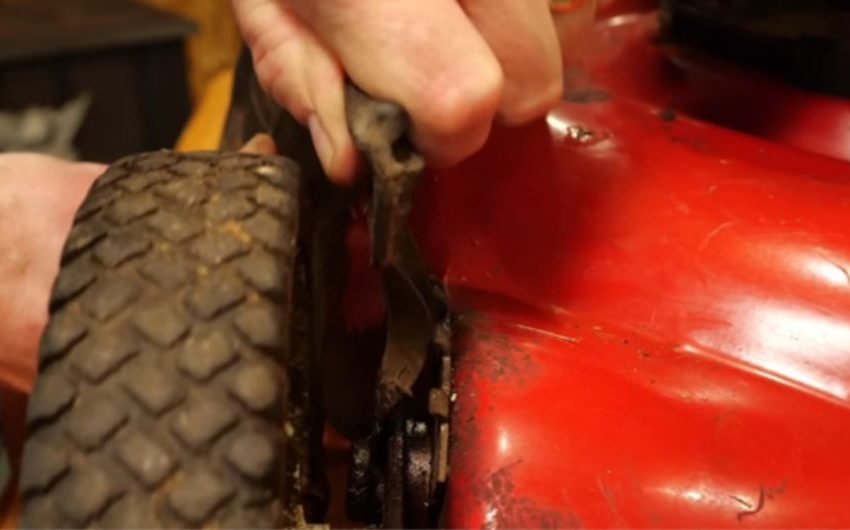 Look for an Uneven Wheel adjuster or Mower Deck