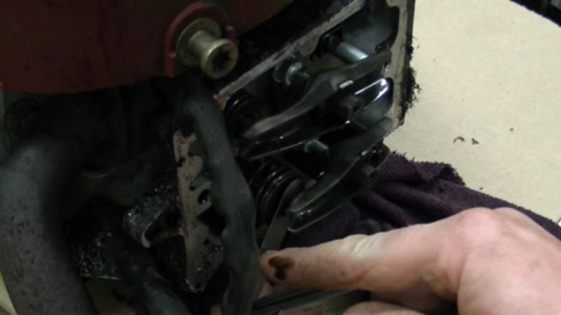 Remove the Spark plug & Check the Existing Gap between the Valves 6